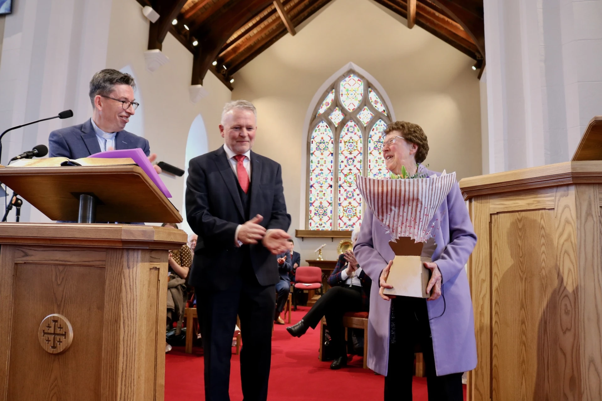 Mrs Shirley Crutchley receives a warm round of applause