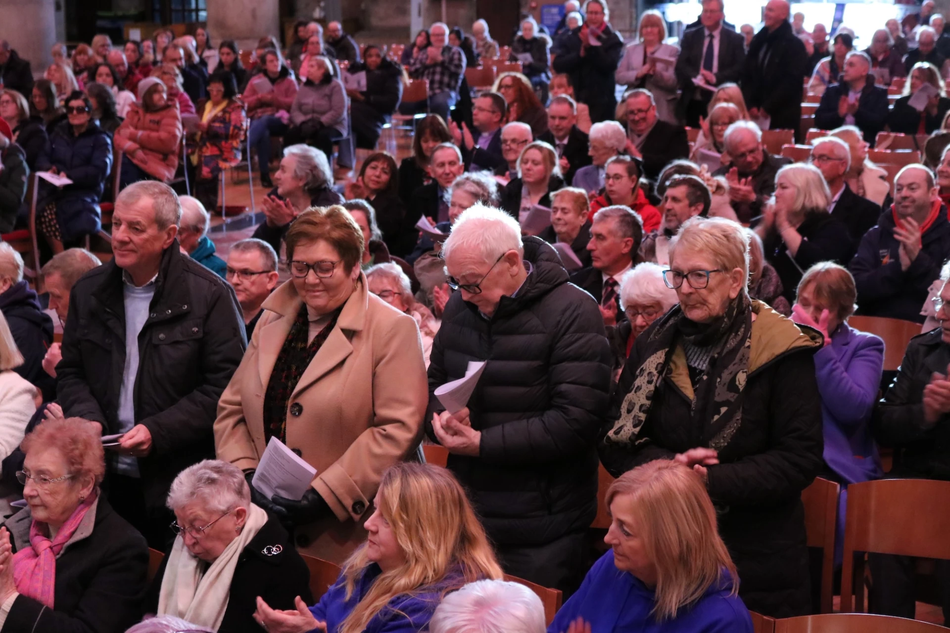 Each charity stood when their name was called