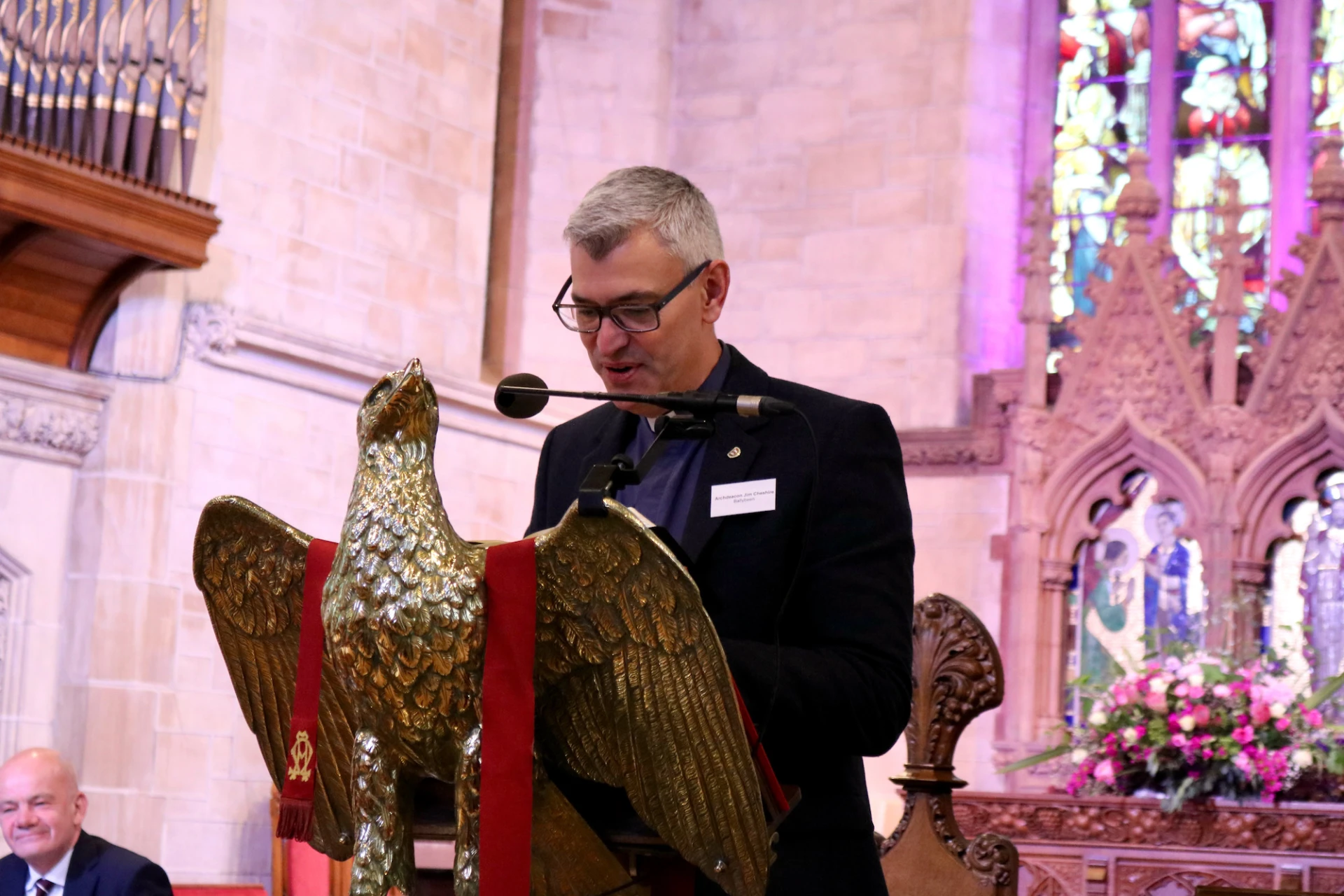 Archdeacon Jim Cheshire gives the reading
