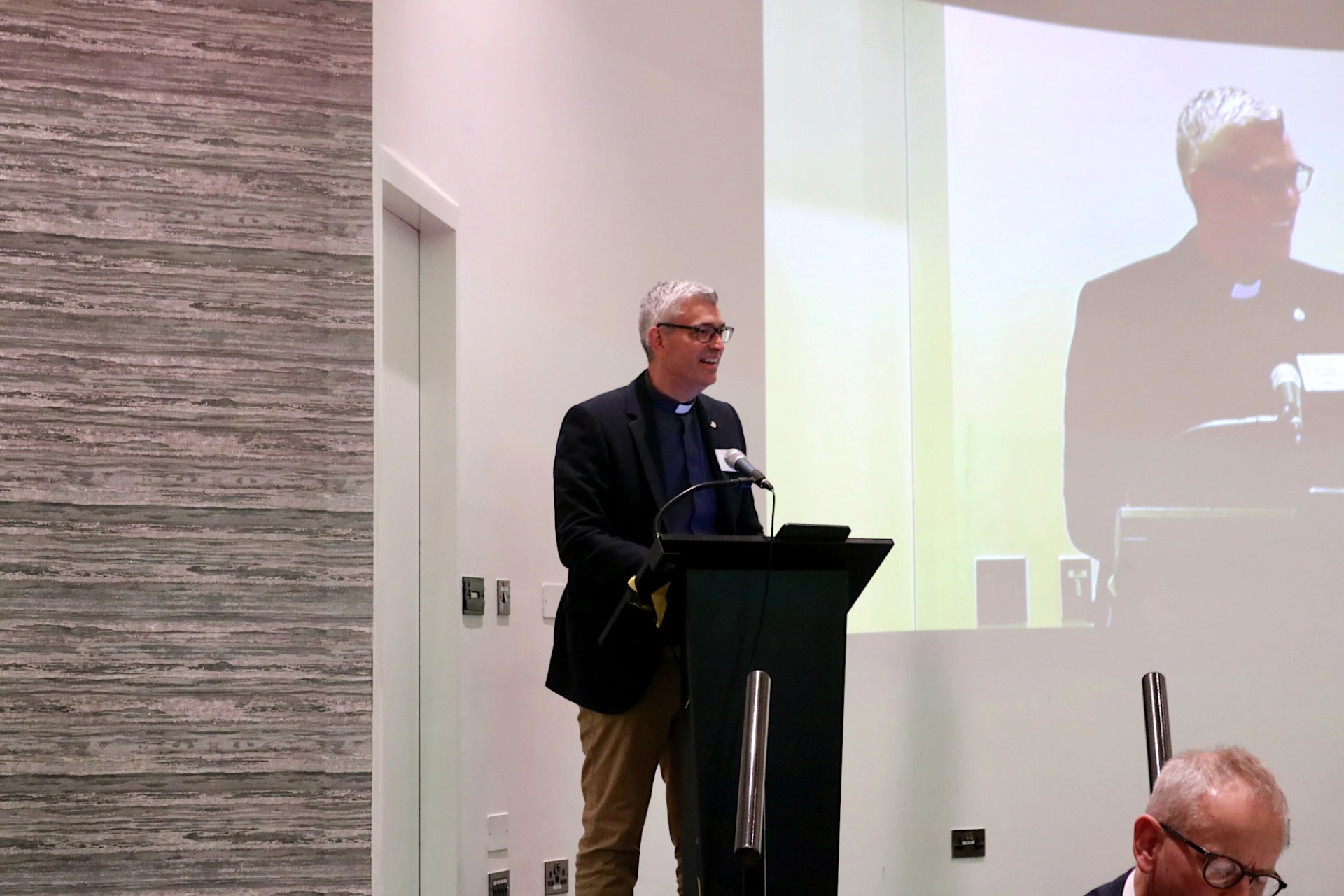 Archdeacon Jim proposes the Report of the Standing Committee