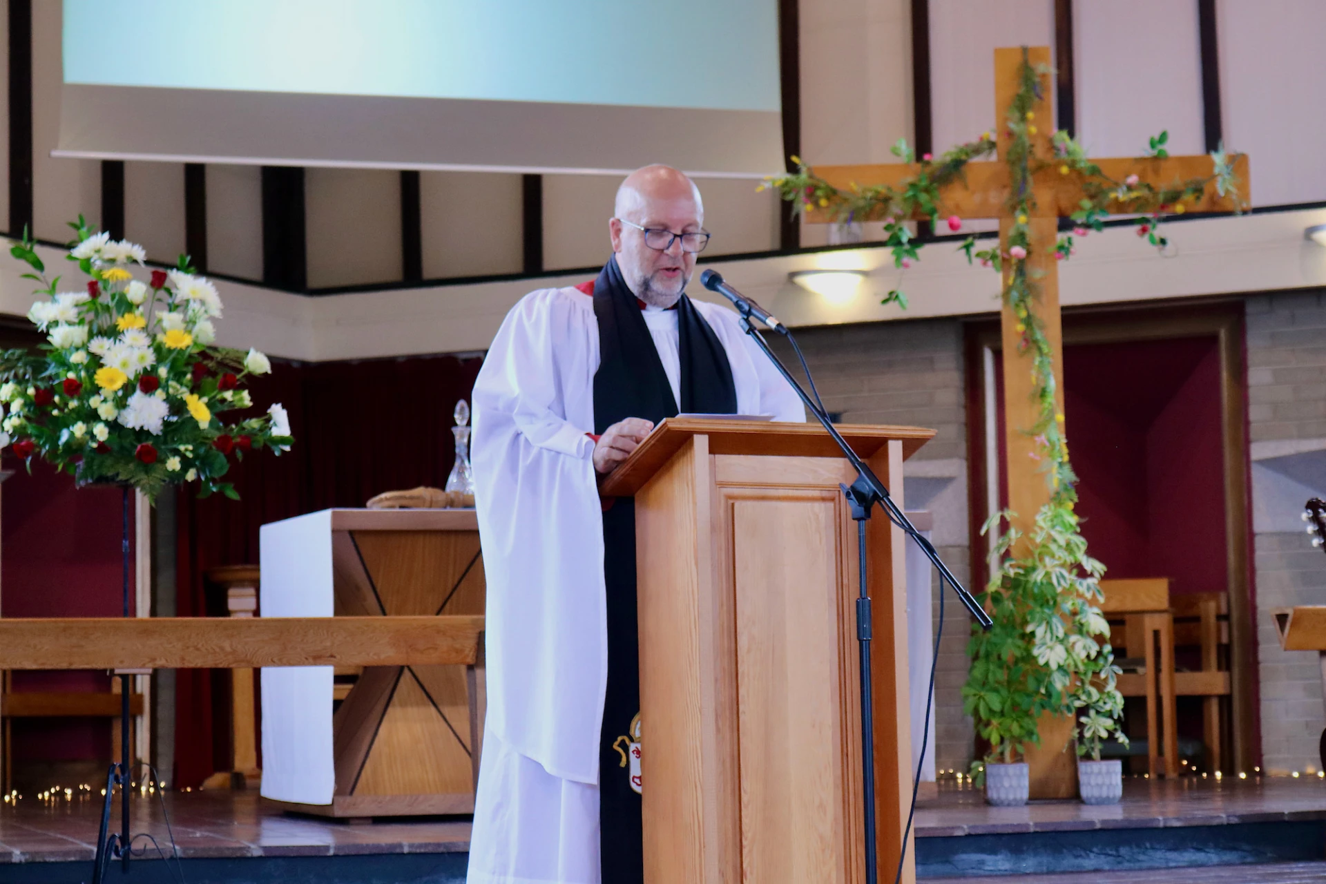 Archdeacon Mark Harvey gives the address