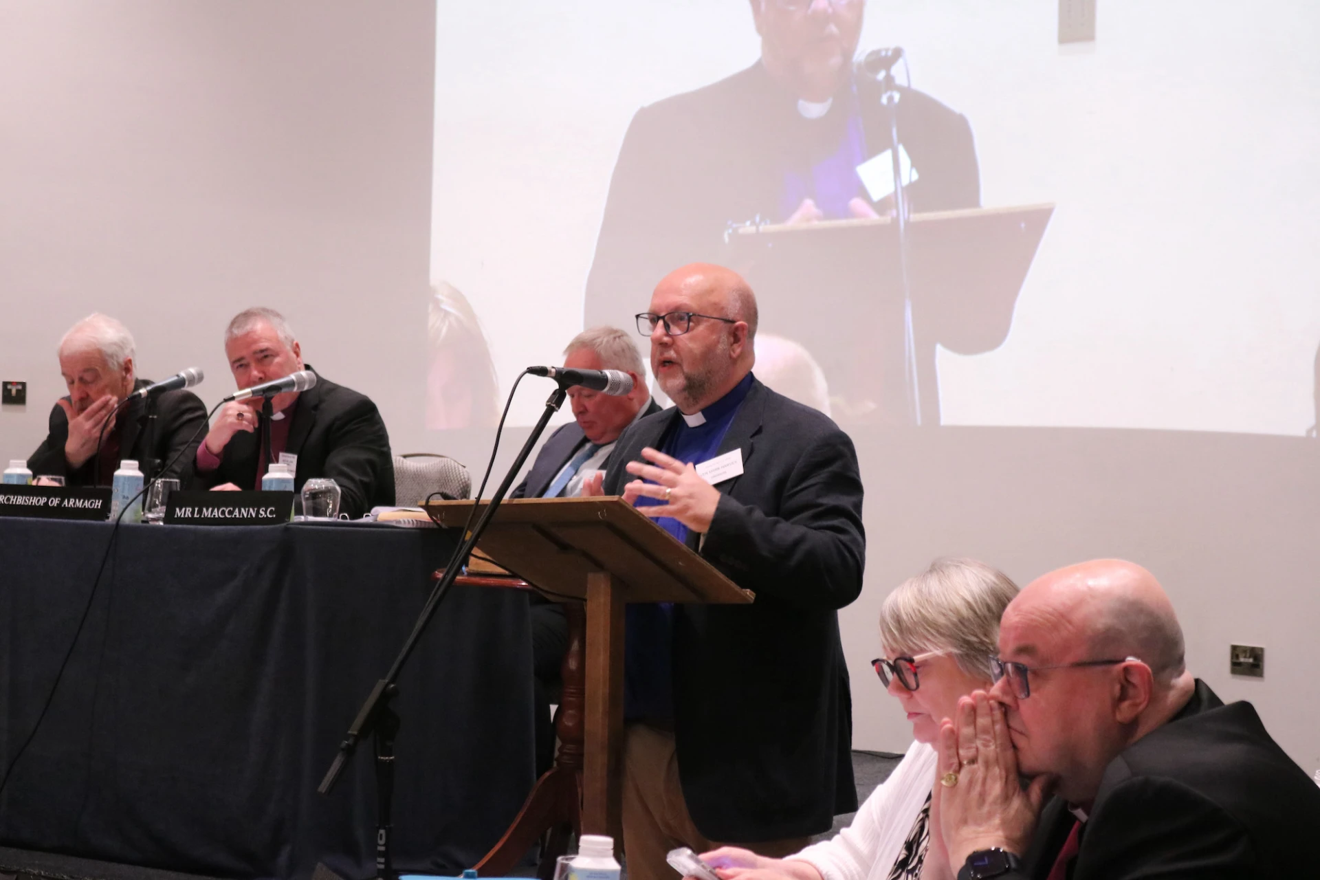 Archdeacon Mark speaks to a motion