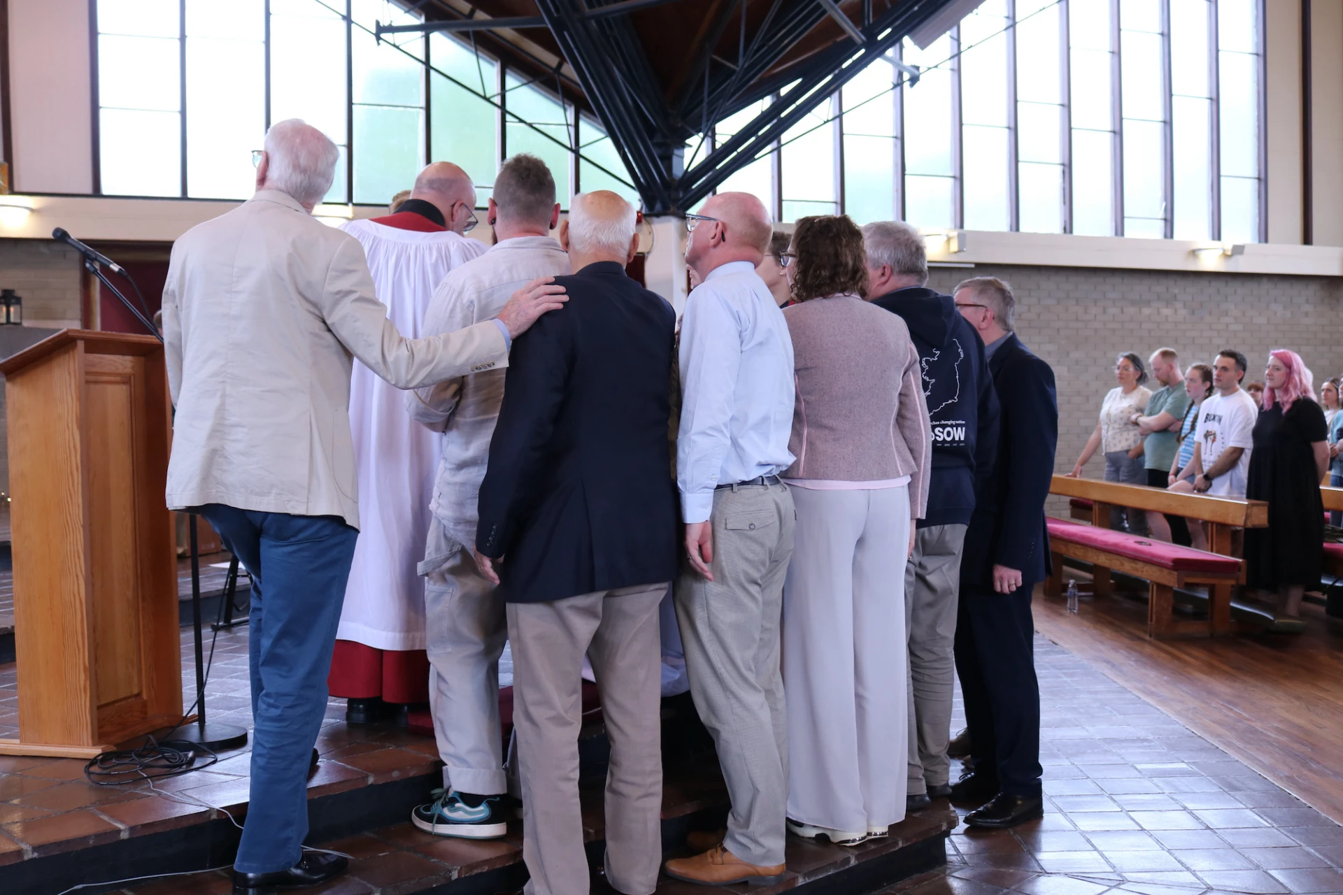 Bishop David and other presbyters lay hands on Andrew