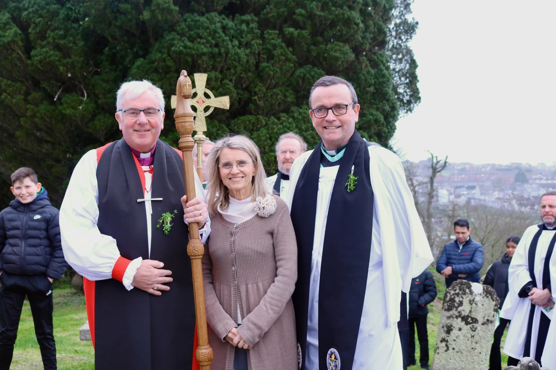 Bishop David, Päivi Rasanen and Dean Blair at Patrick's grave