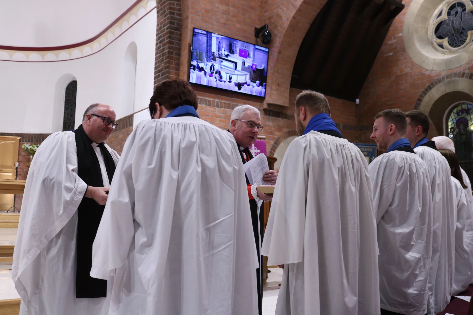The new readers are commissioned and presented with a Bible