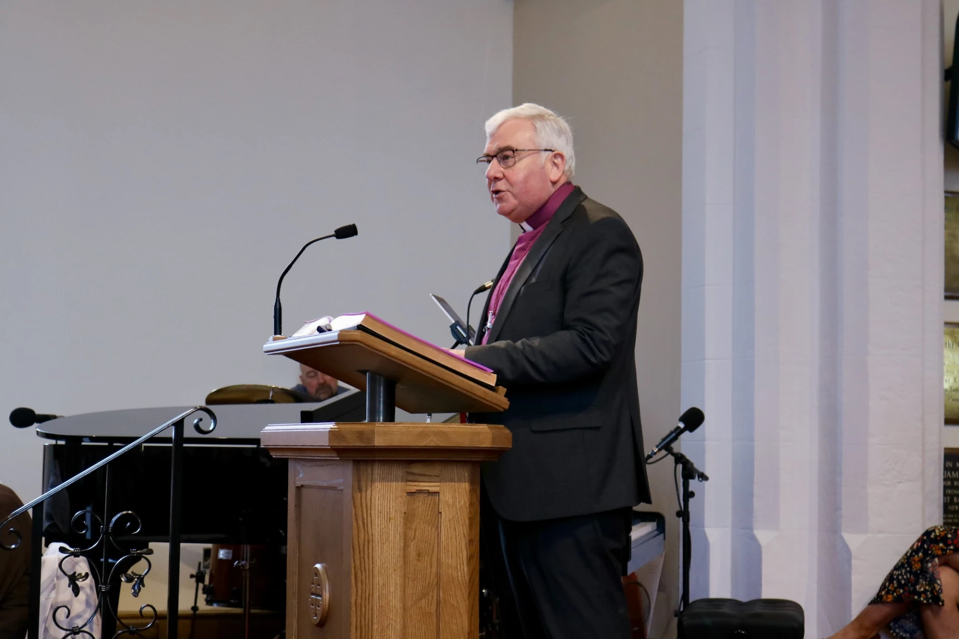 Bishop David opens in prayer
