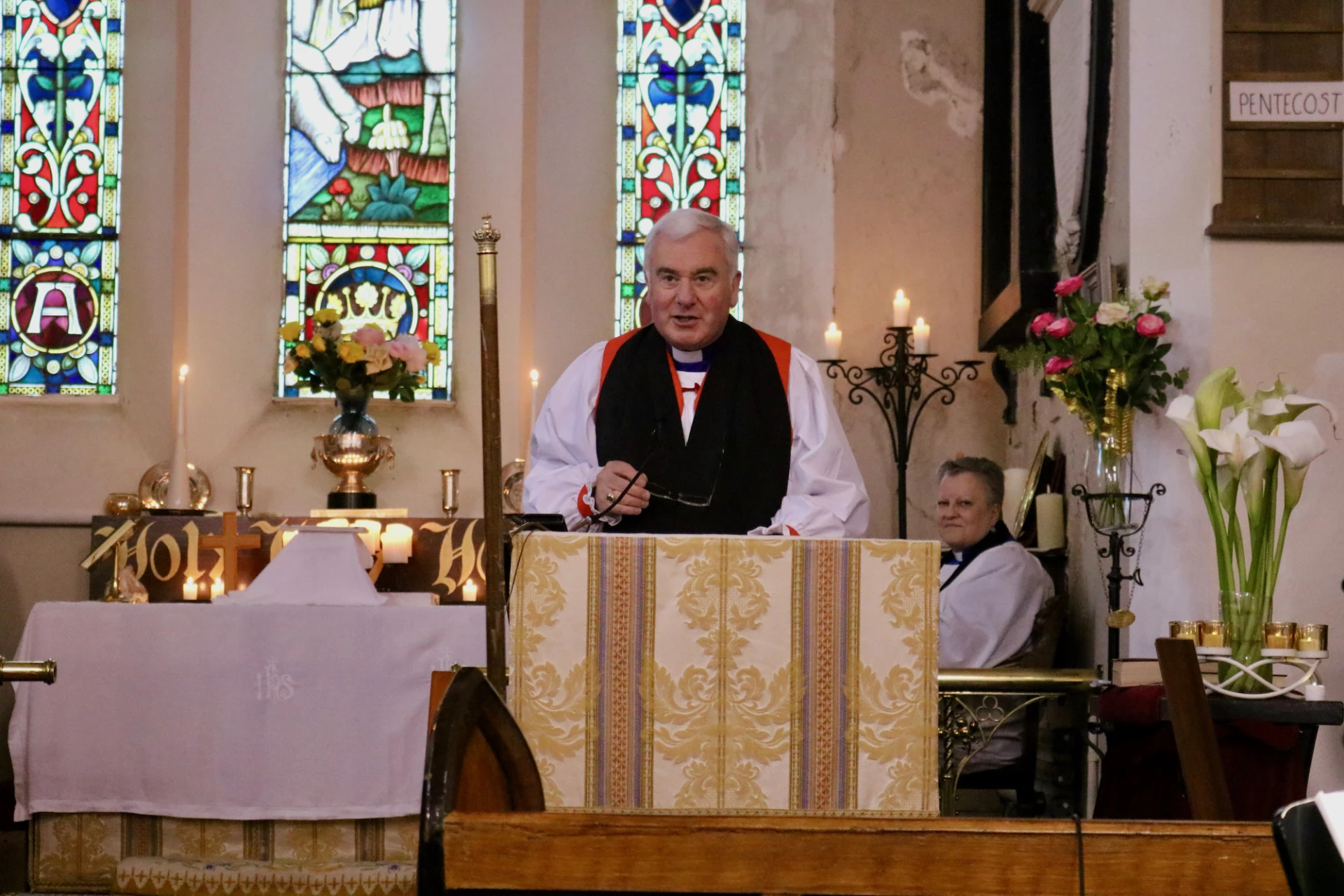 Bishop David opens the service