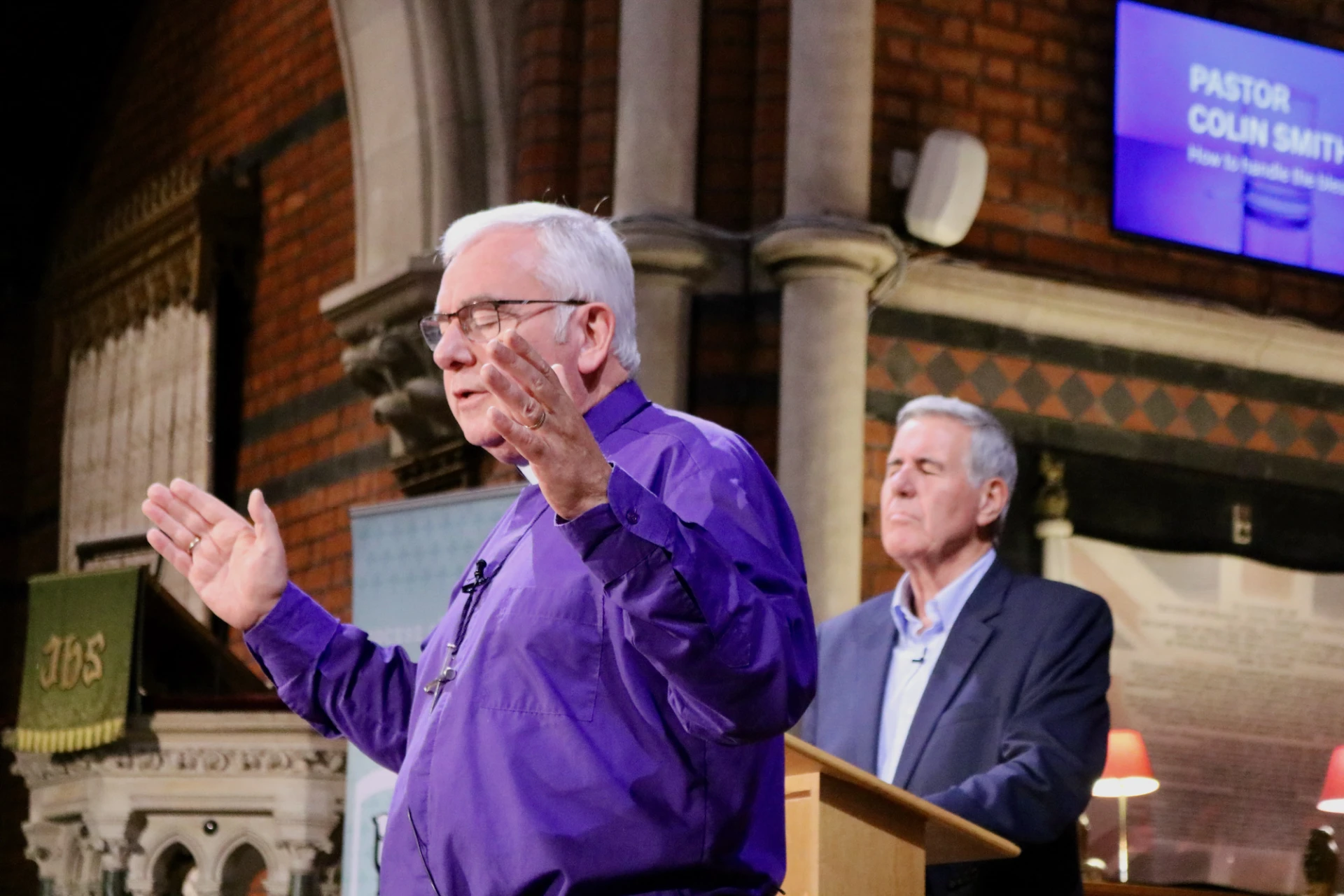 Bishop David prays