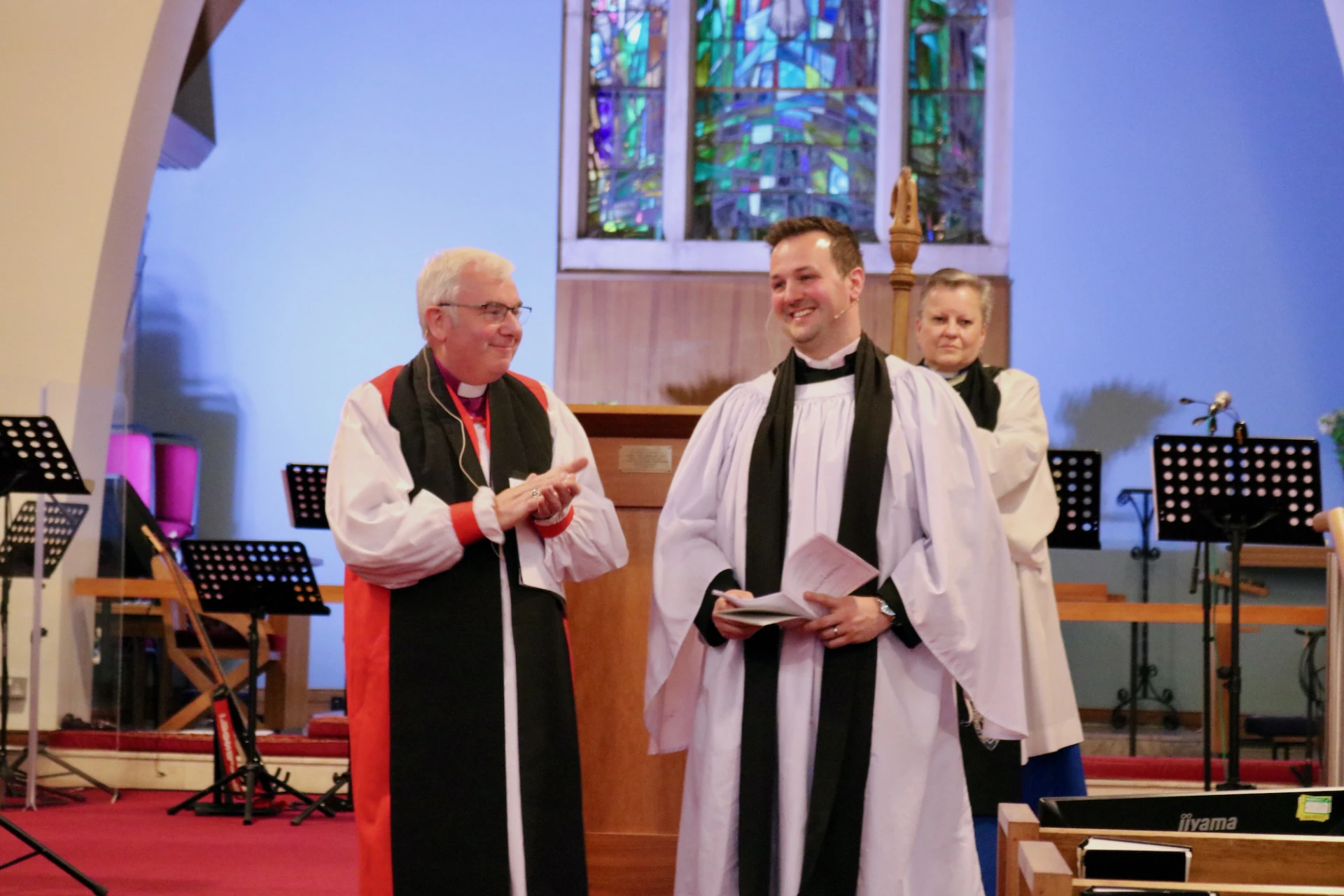 Bishop David presents the new rector