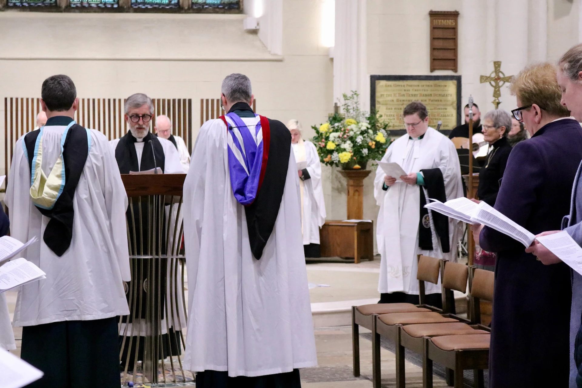 Canon Chancellor John Auchmuty installs the Dean