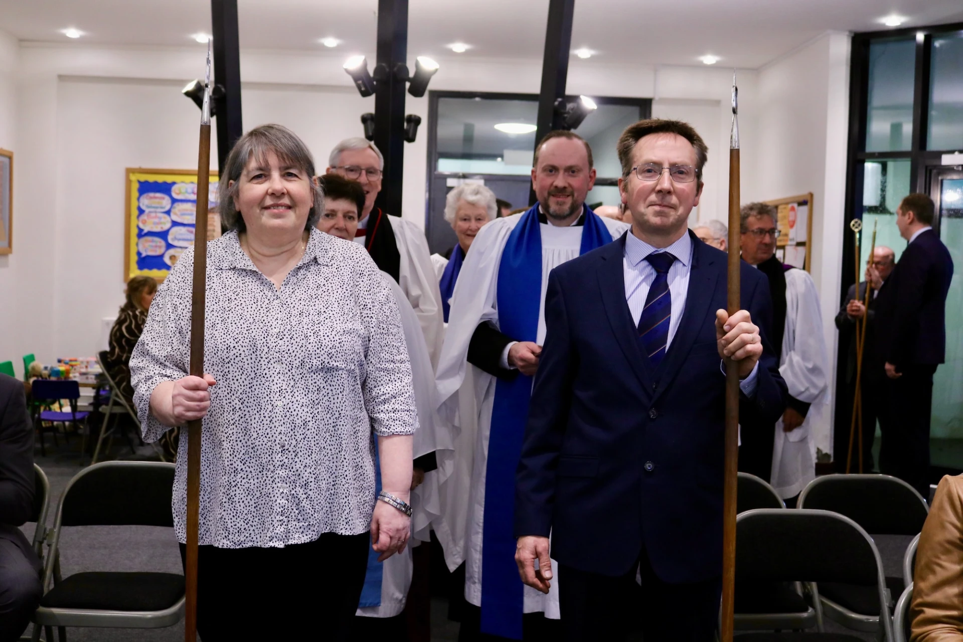 Church Wardens lead the procession