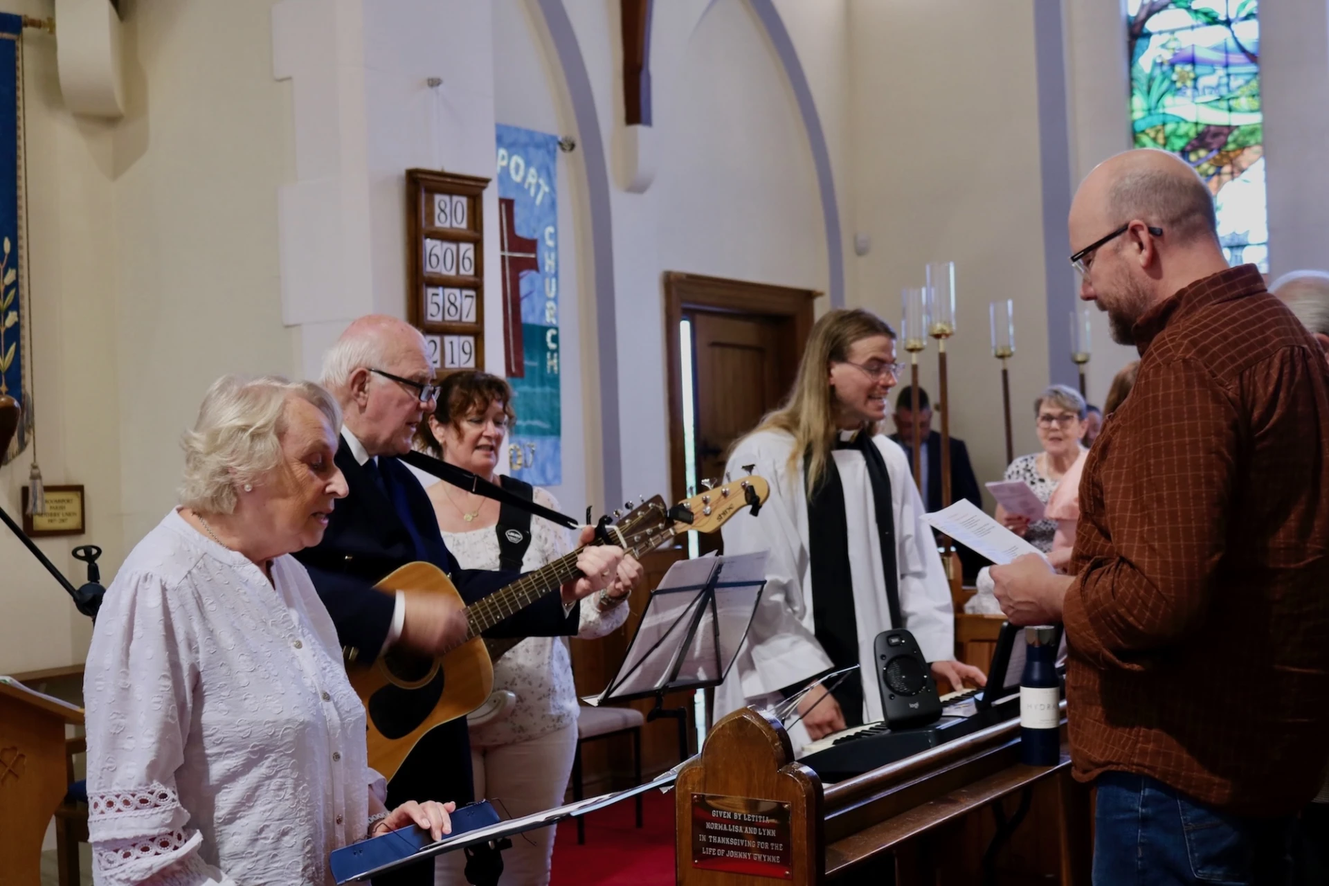 Elliot leads the praise band