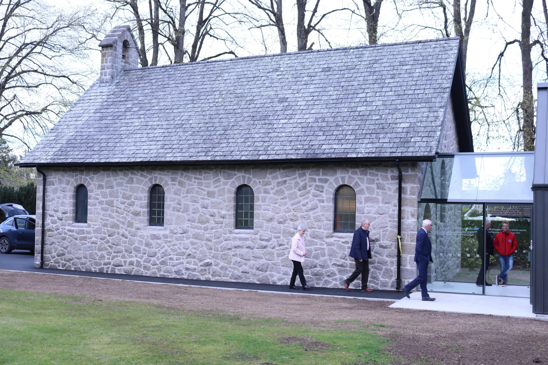 A glass corridor joins the buildings