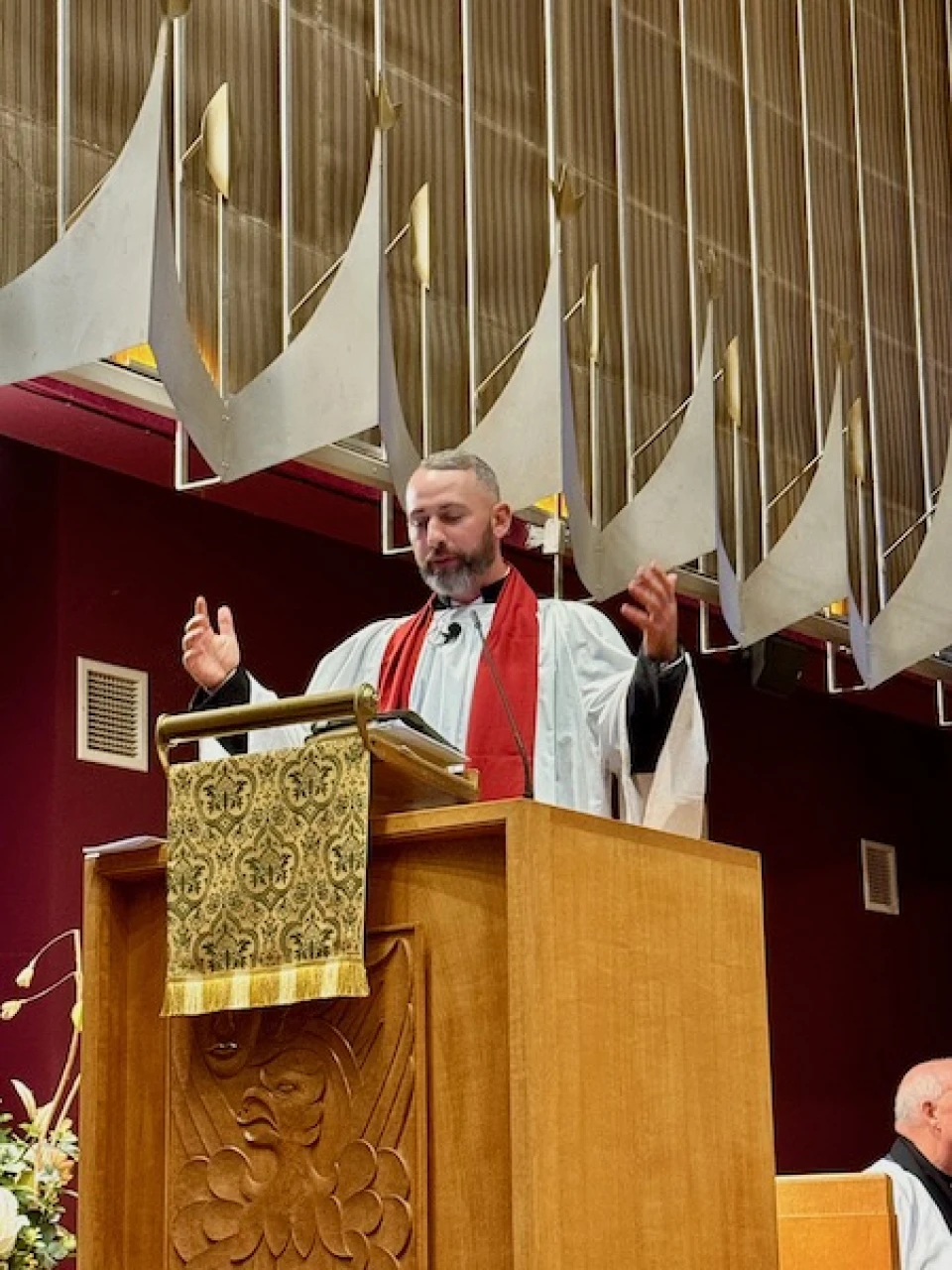 Laurence leads the prayers