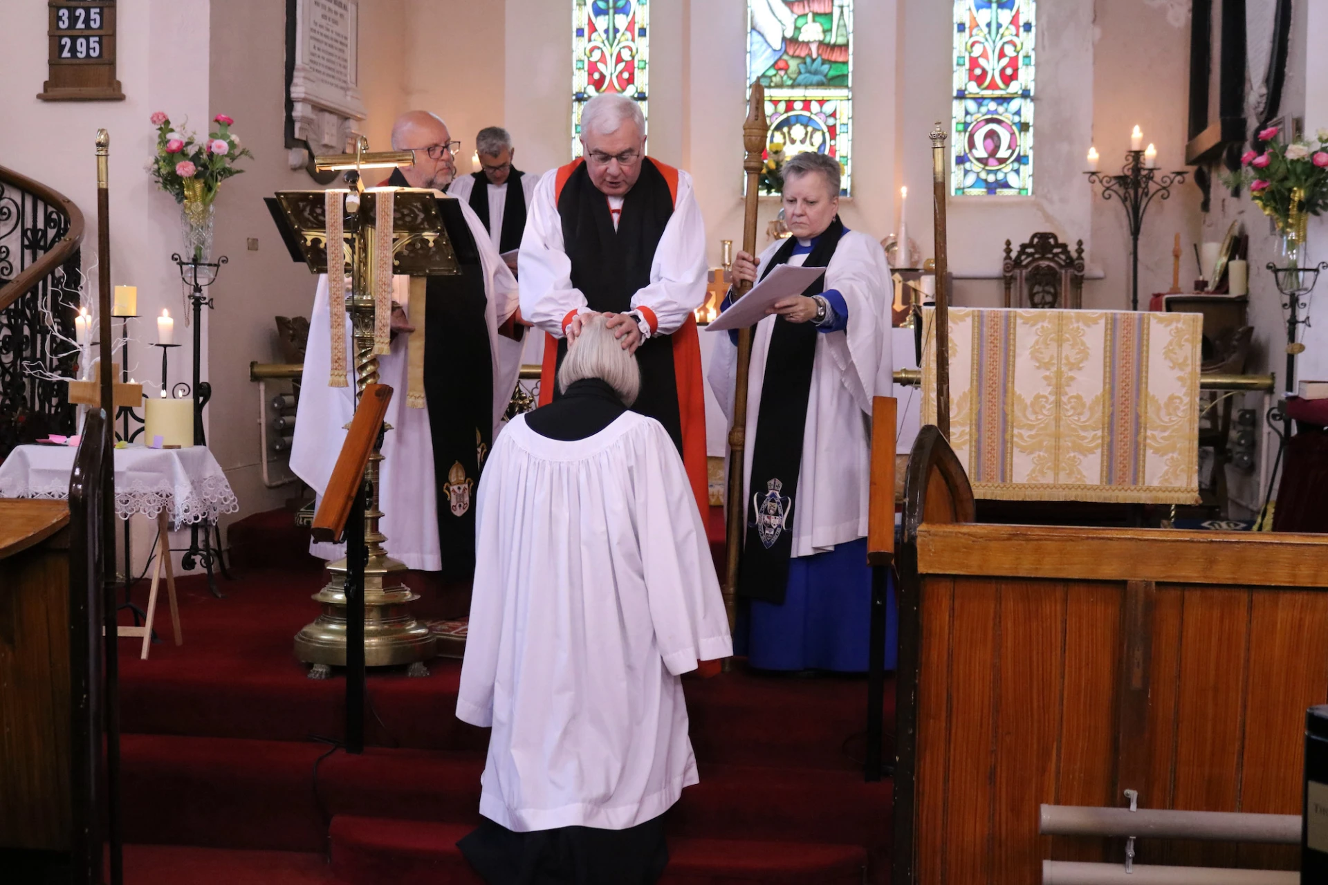 Bishop David prays over Melanie