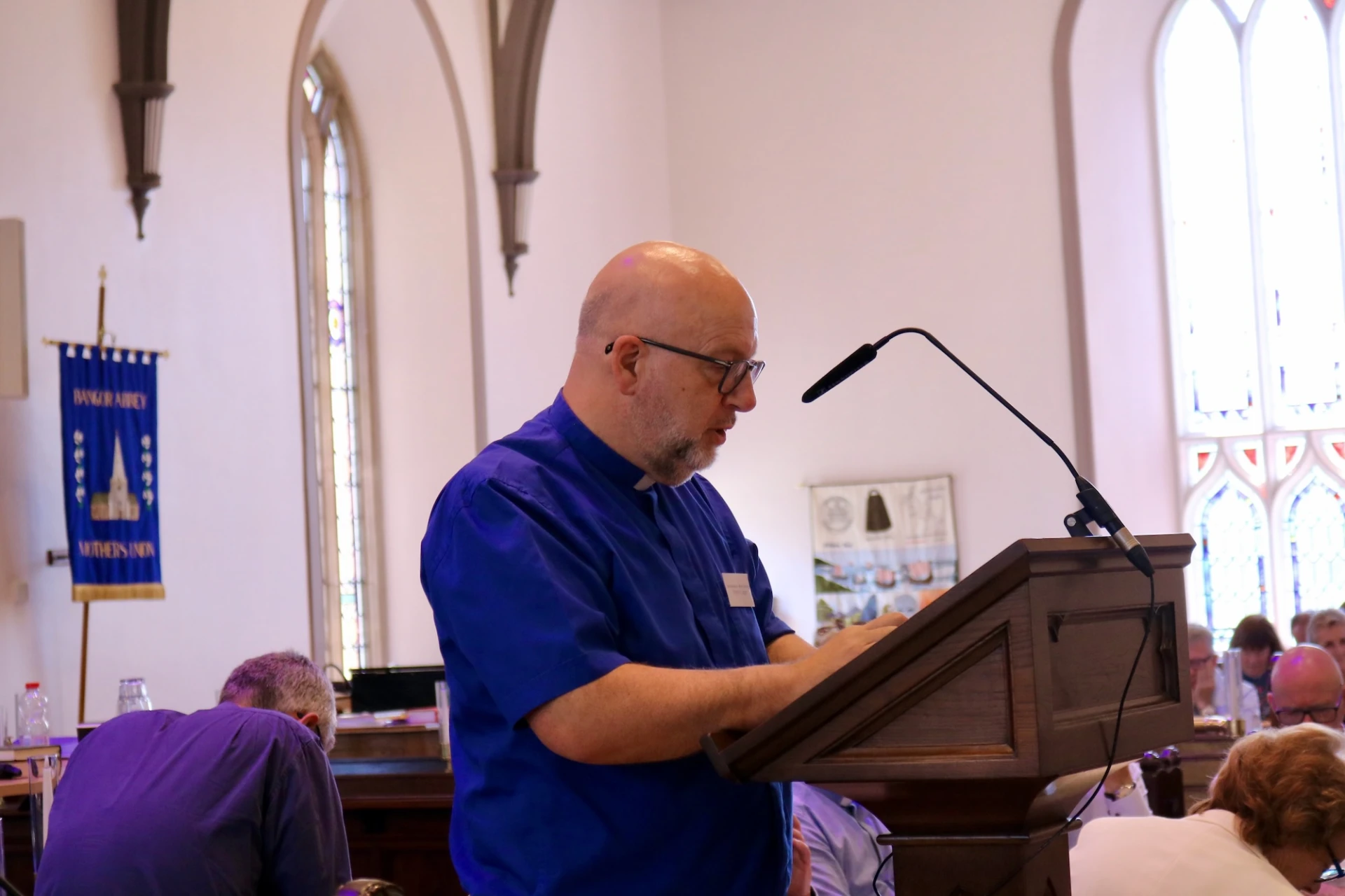 Archdeacon Mark opens in prayer