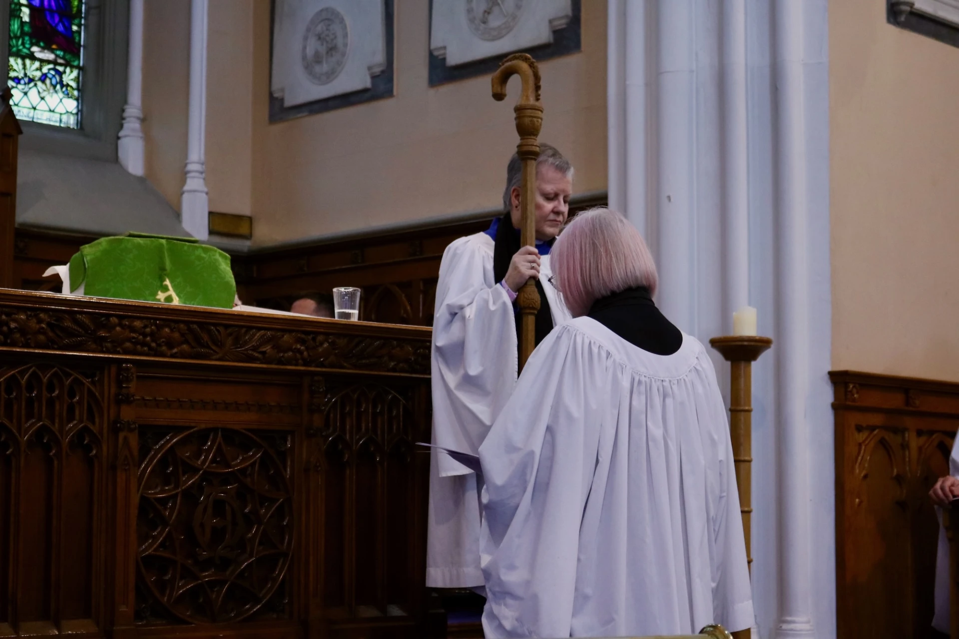 Melanie kneels for prayer
