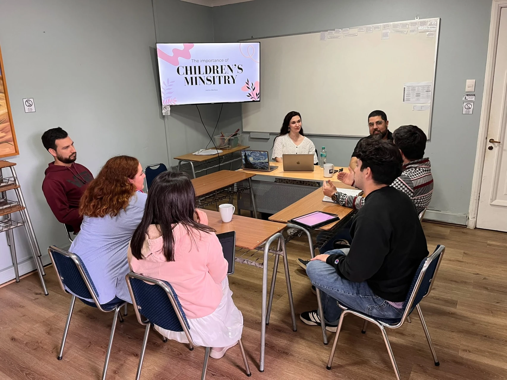 Millie delivers a seminar on children's ministry