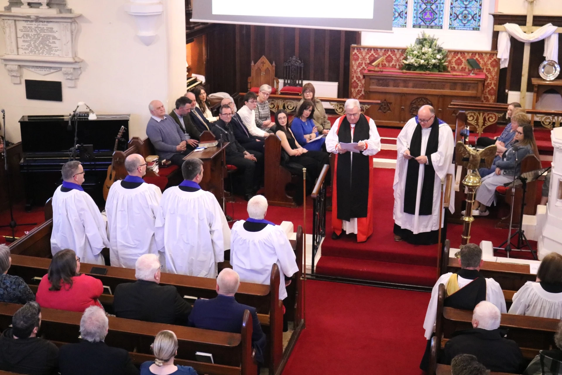 Warden of Readers, Revd Willie Nixon presents the four for commissioning