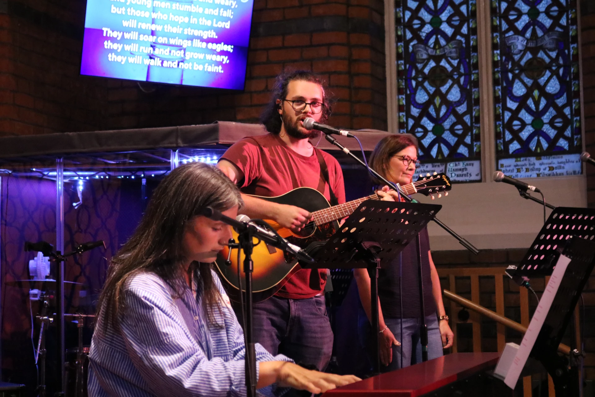 Simon, Jude and the band leading worship