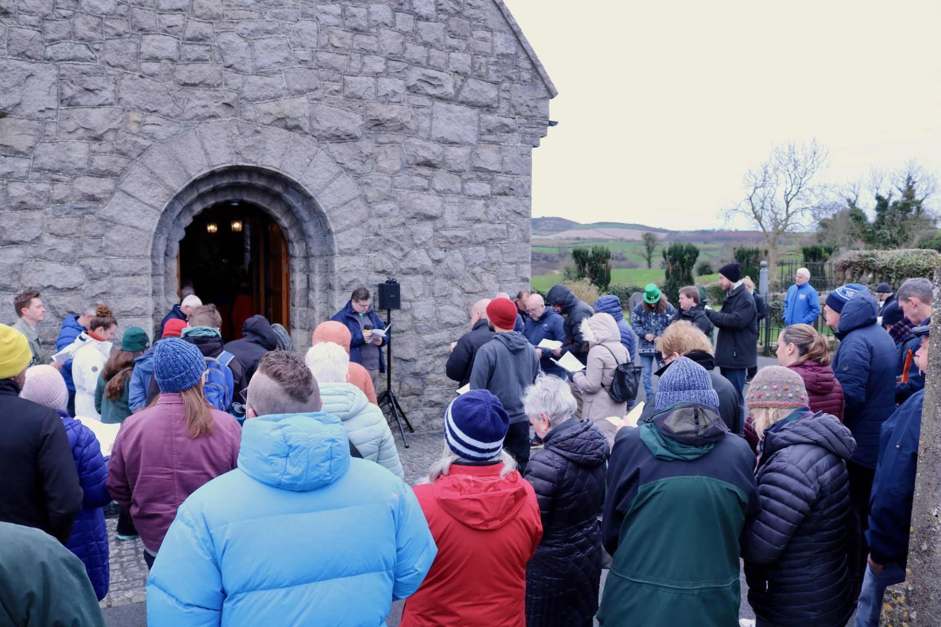 The outdoor congregation at Saul Church