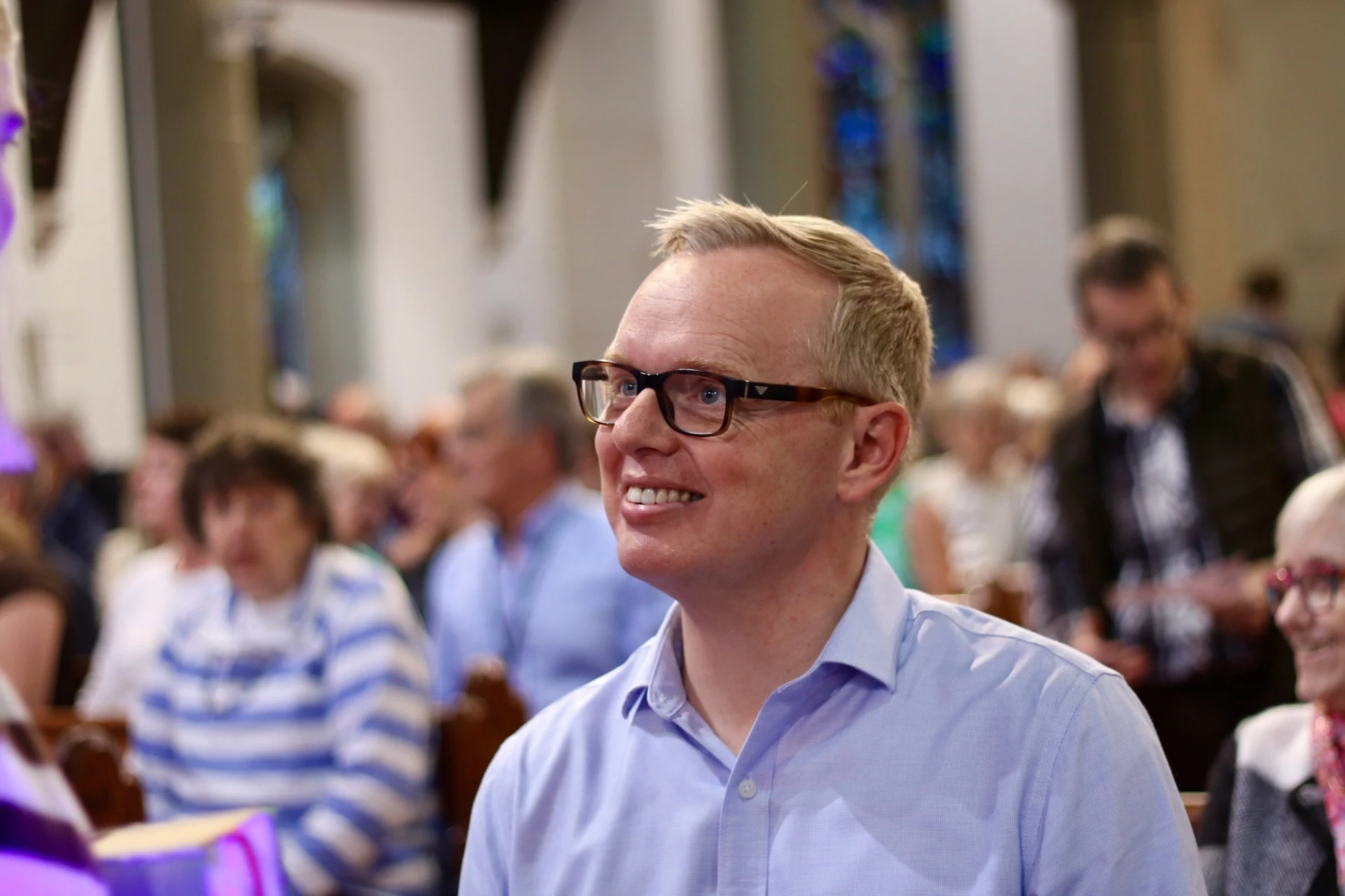 Tim Robinson chats before the service