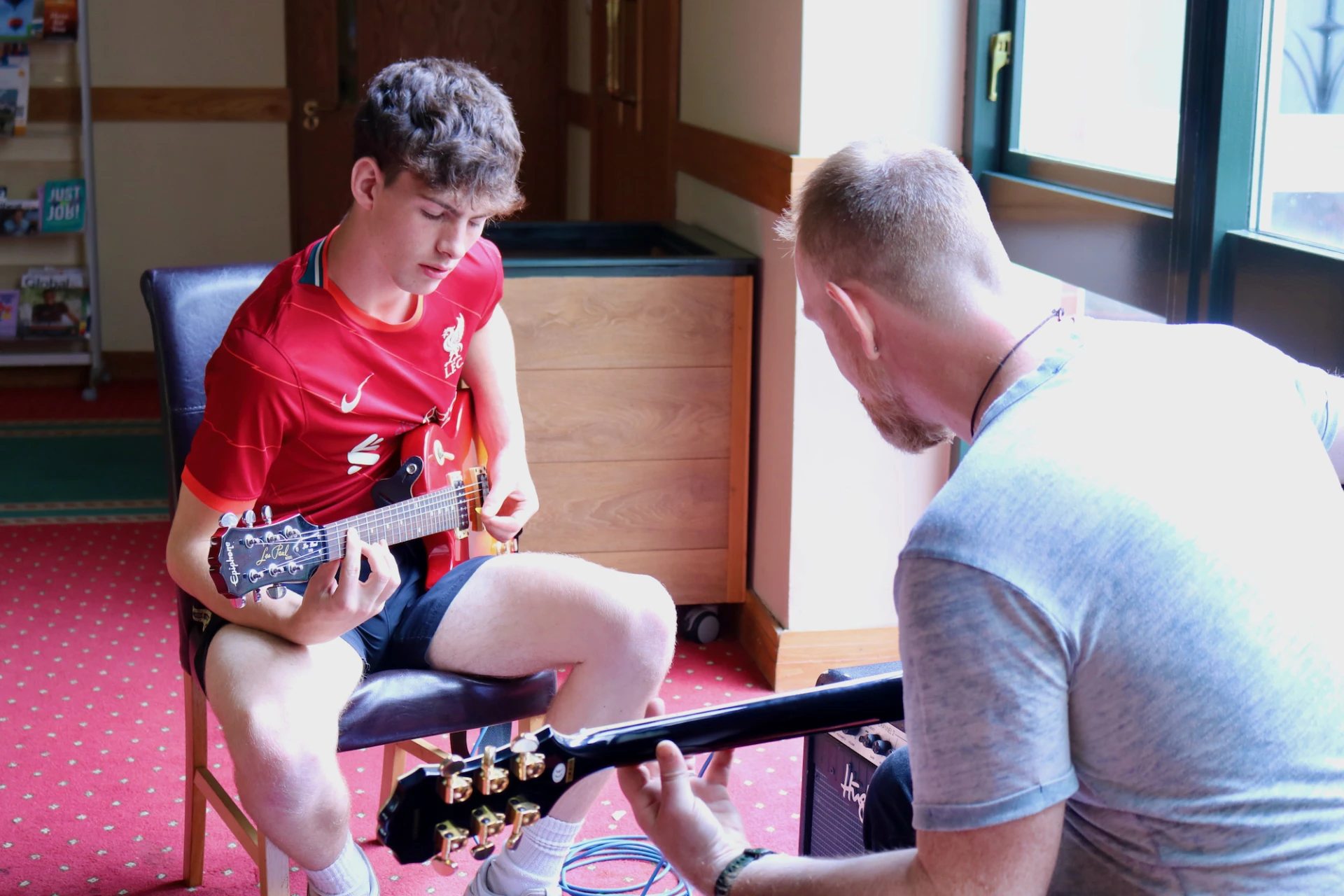 Trev coaches guitar